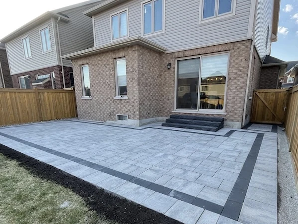 Backyard patio with natural stone steps in Newmarket, Ontario