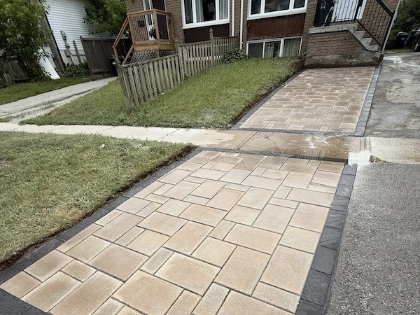 Driveway extension with border made with interlock stone in Oakville, Ontario